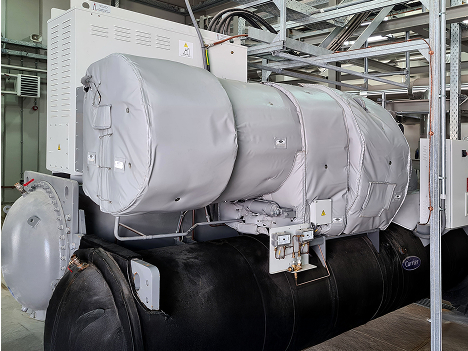 Custom designed removable reusable acoustic blanket and jacket insulation on industrial liquid chiller