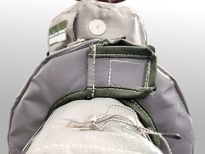 Close-up of a precision-fitted insulated end cap on removable blanket insulation 