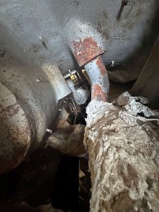 Old damaged insulation removed from a steam turbine before site measurements